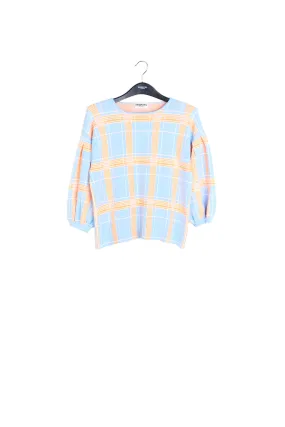 Light blue puffed sleeve knitted top with check motif